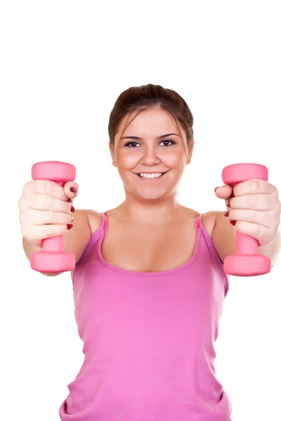 Chica sonriente haciendo ejercicio con pesas — Foto de Stock