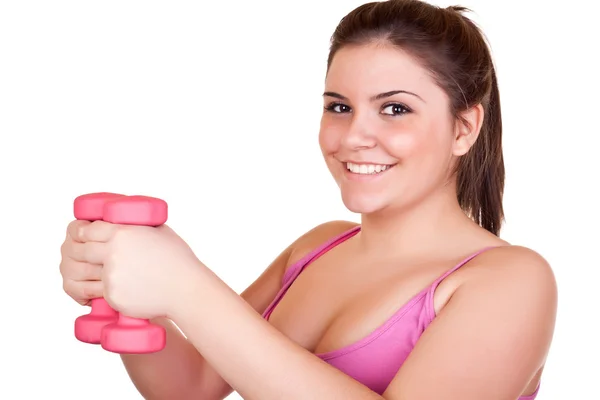 Lachende meisje oefenen met gewichten — Stockfoto