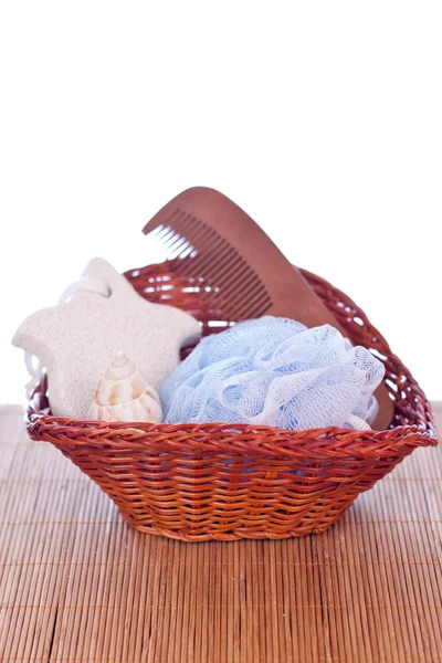 Basket with sponge and comb — Stock Photo, Image