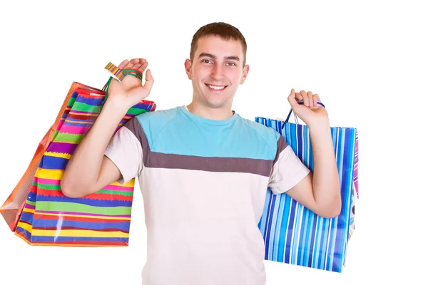 Gülümseyen adam alışveriş torbaları holding — Stok fotoğraf