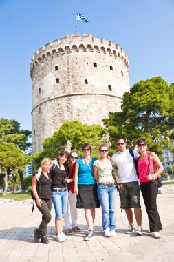 Happy group tourist in Greece clipart