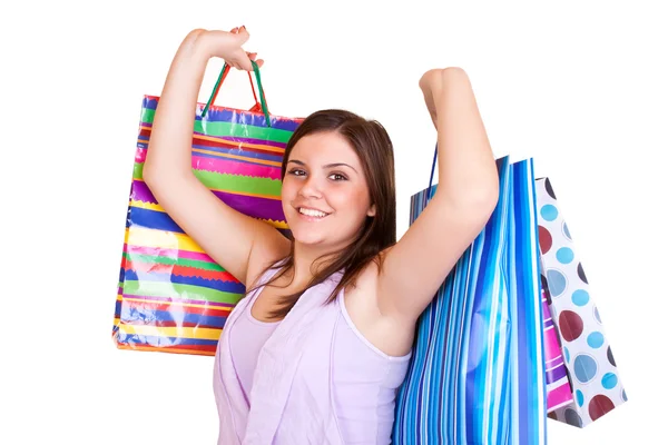 Mulher segurando sacos coloridos — Fotografia de Stock