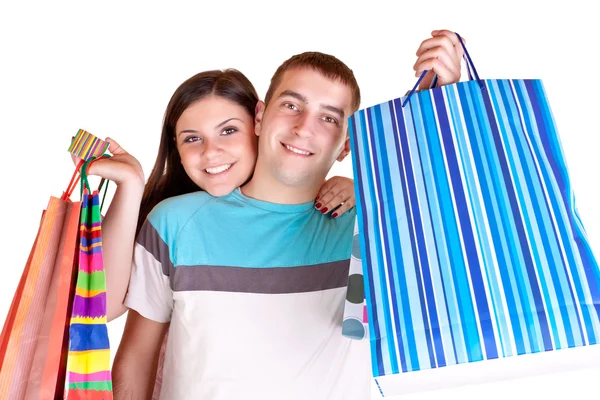 Młoda para z torbami na zakupy — Zdjęcie stockowe