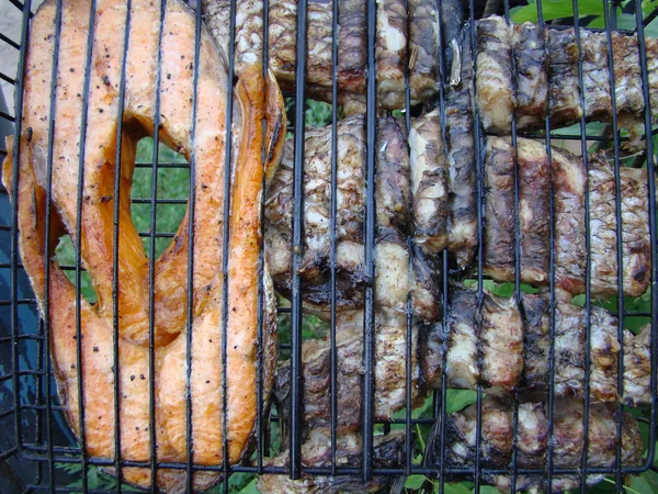 Stock image Fish steak cooking on a grill