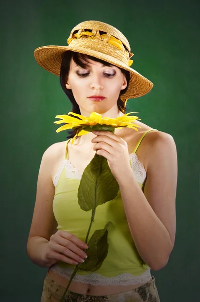 Beautiful woman with sunflowers — Stock Photo, Image