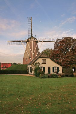 House and windmill in the Netherlands clipart