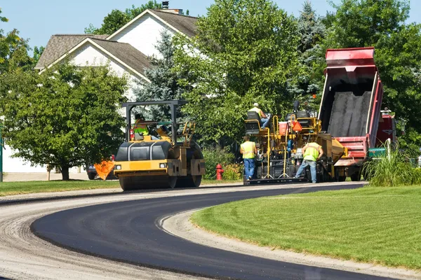 Laying new pavement — Stock Photo, Image