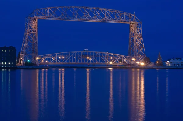 stock image Duluth aerial bridge dusk