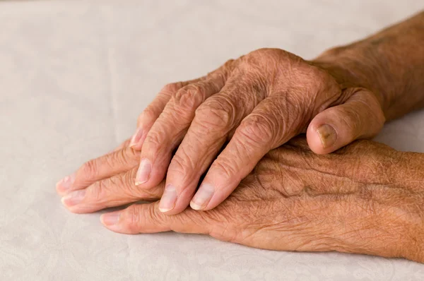Folded elder hands — Stock Photo, Image