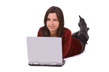 Woman working on a laptop clipart