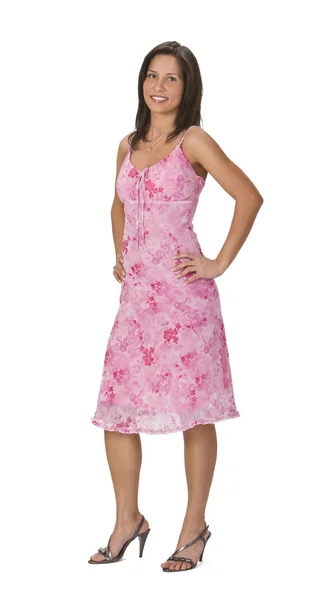 Vrouw in een roze jurk — Stockfoto