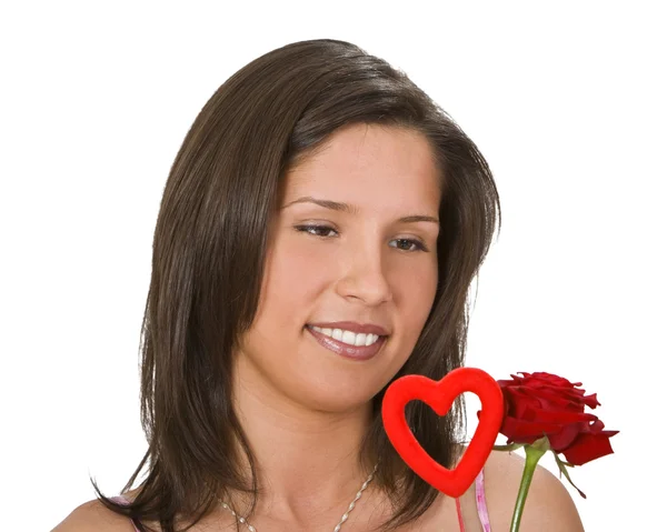 Vrouw met een roos en een hart — Stockfoto