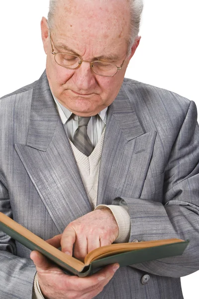 Senior reading a book — Stock Photo, Image