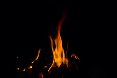 Flame on the black background clipart