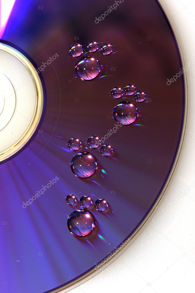 Water drops on cd background