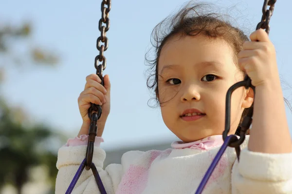 Swing little girl — Stock Photo, Image