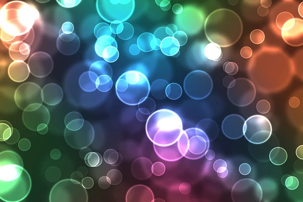 Abstrakt glödande cirklar på en färgglad bak — Stockfoto