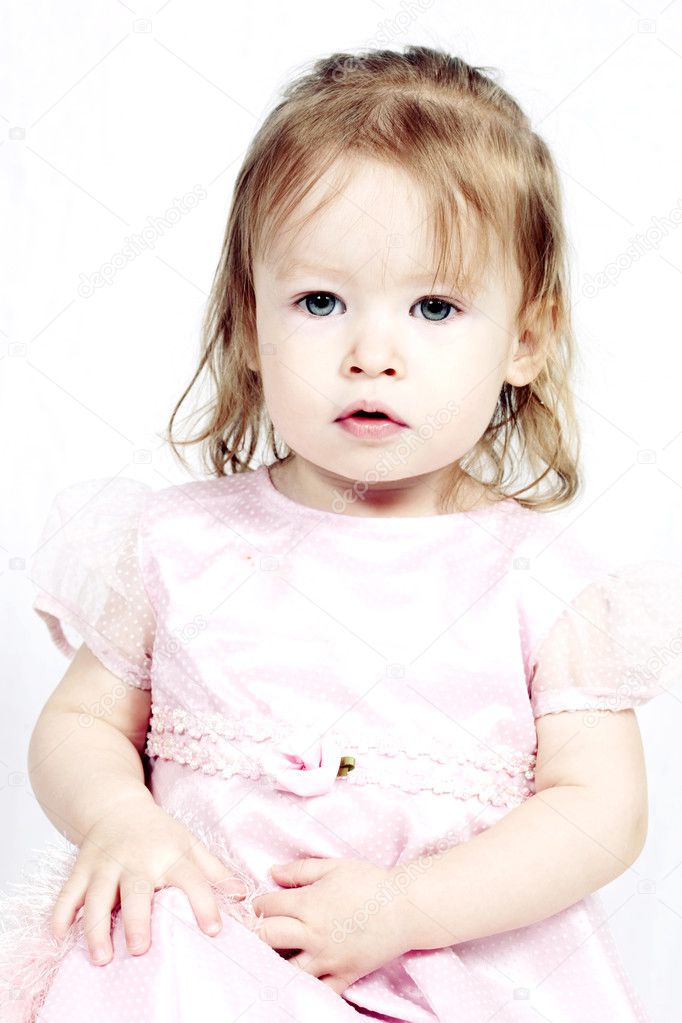 Little Girl in pink dress with white background