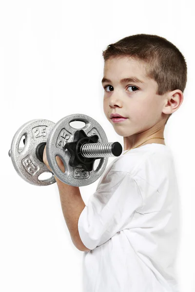 Healthy lifestyle child exercising dumbbell weig — Stock Photo, Image