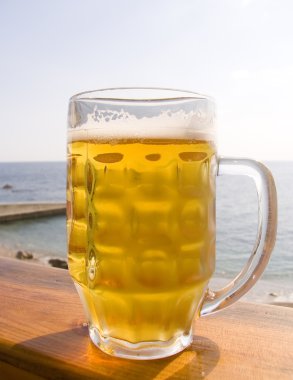 Mug of cold beer clipart