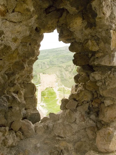 Window in an old stone fortress — Stock Photo, Image