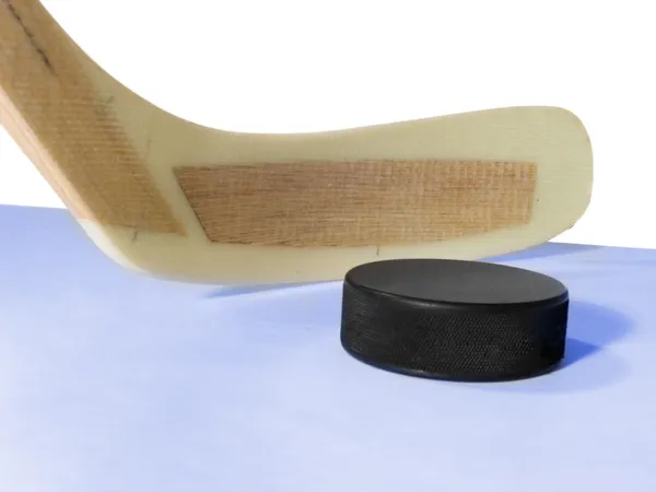Hockey stick and puck — Stock Photo, Image