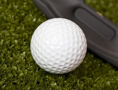 Golf ball and stick clipart