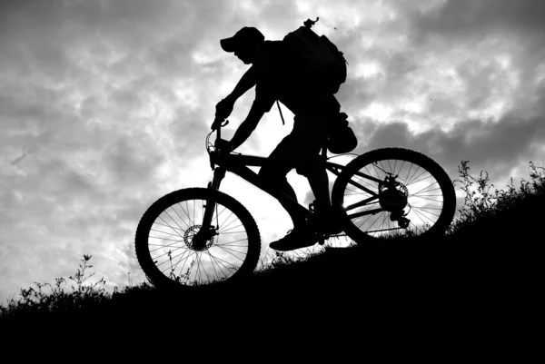 Motociclista downhill — Fotografia de Stock