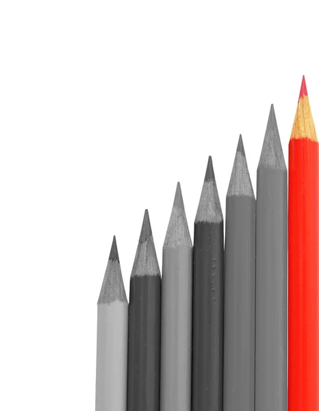 Lápis vermelho entre cinza — Fotografia de Stock