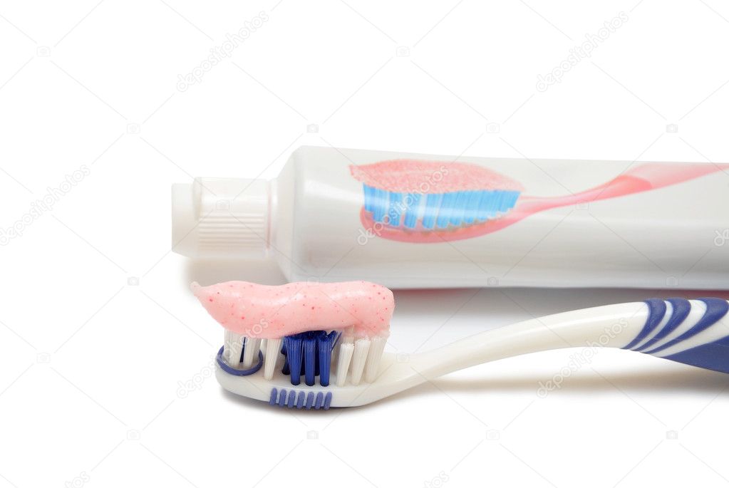 Toothbrush beside toothpaste