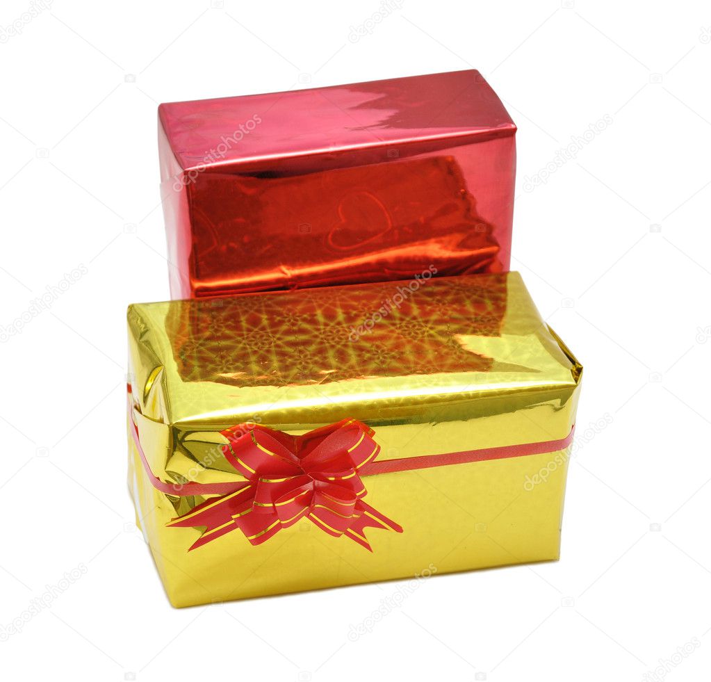 Gift in golden wrapping with red bow