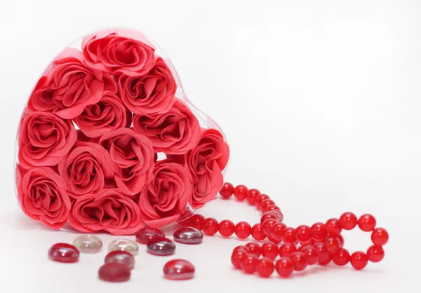 stock image Heart from red dews, a beads on a white