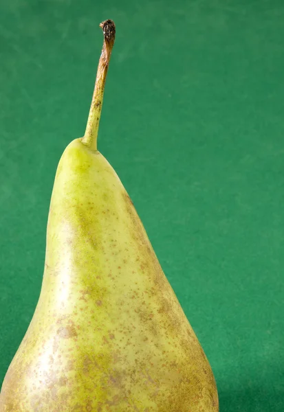 Pear part on a green background — Stock Photo, Image