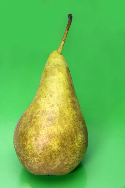Pear on a green background — Stock Photo, Image