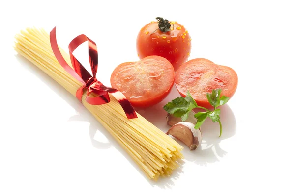 Tomatoes and spaghetti — Stock Photo, Image
