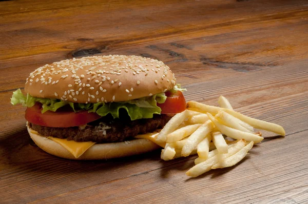 Hamburger and potatoes — Stock Photo, Image