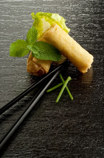 Roll spring with chopsticks — Stock Photo, Image