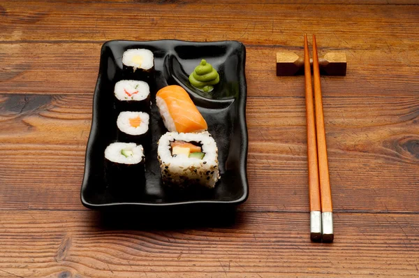 stock image Dish of Sushi with chopstick