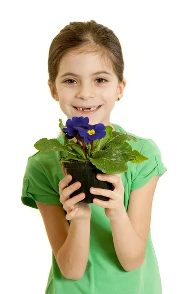 Usmívající se dítě s květinou — Stock fotografie