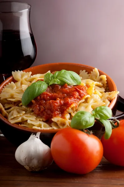 Tomatoes farfalle typical italian pasta — Stock Photo, Image