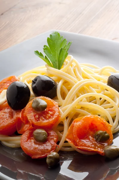 Dish with fresh tomatoes spaghetti — Stock Photo, Image