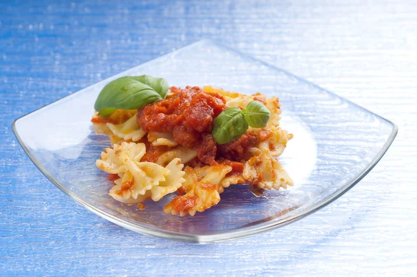 Tomatoes farfalle typical italian pasta — Stock Photo, Image