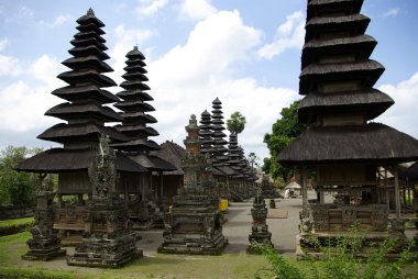 Typical pointed roofs in Bali island clipart