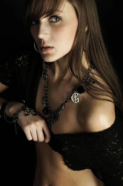 Beautiful young woman on black — Stock Photo, Image