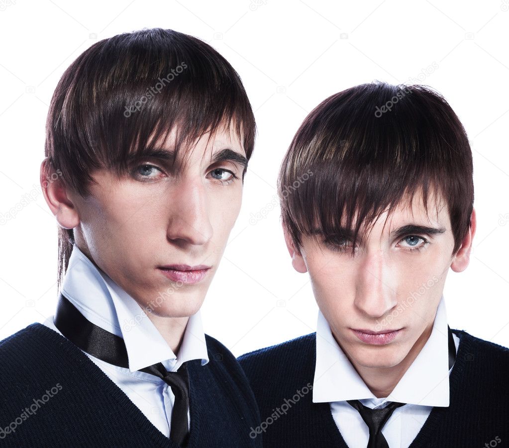 Young twins with fashion haircuts