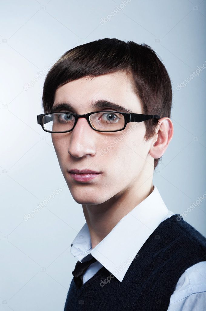 Cute young guy with fashion haircut Stock Photo by ©dpshek 1869251