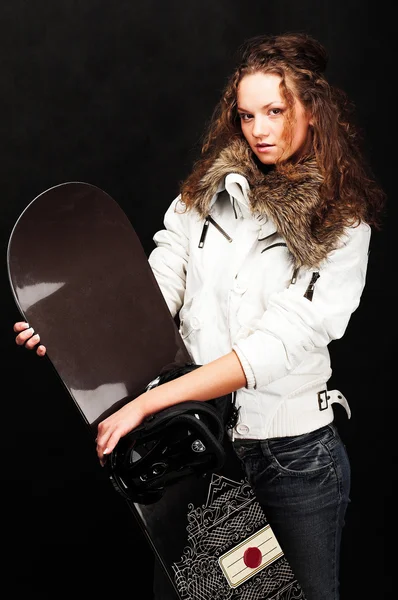 Meisje bedrijf snowboard — Stockfoto