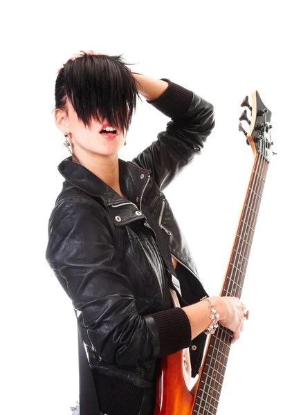 Punk chica sosteniendo una guitarra y cantando —  Fotos de Stock