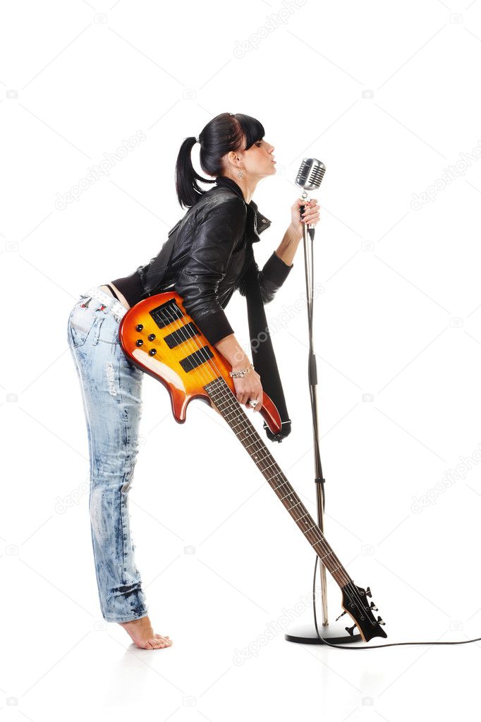 Rock-n-roll girl holding a guitar