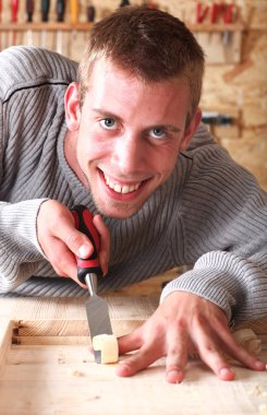 Young smiling carpenter clipart